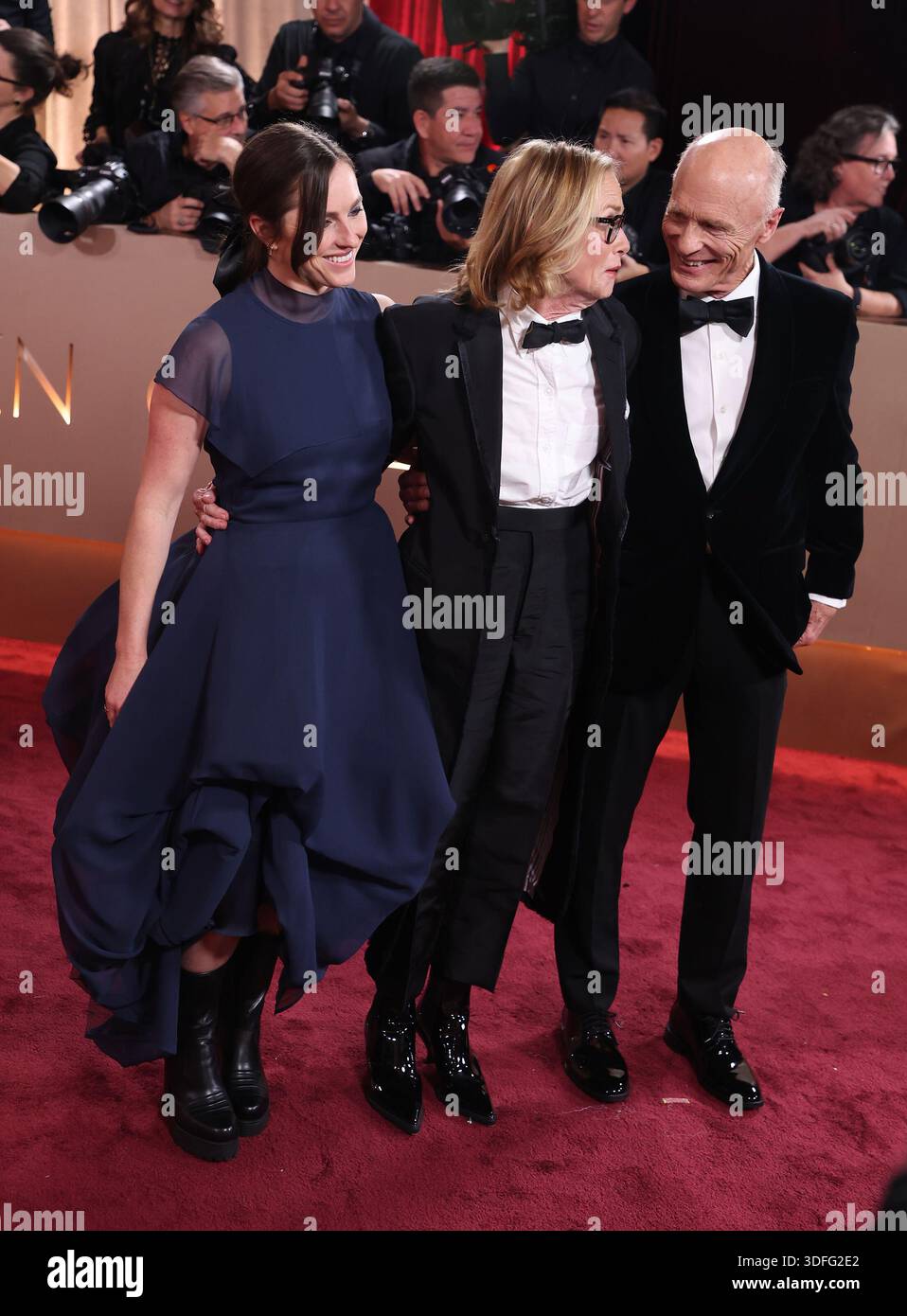 BEVERLY HILLS, CALIFORNIA - JANUARY 11: Amy Madigan, Ed Harris and Daughter at the 83rd Annual Golden Globe Awards at The Beverly Hilton on January 11, 2026 in Beverly Hills, California. EDITORIAL USAGE ONLY! Not for Commercial USAGE! Stock Photo