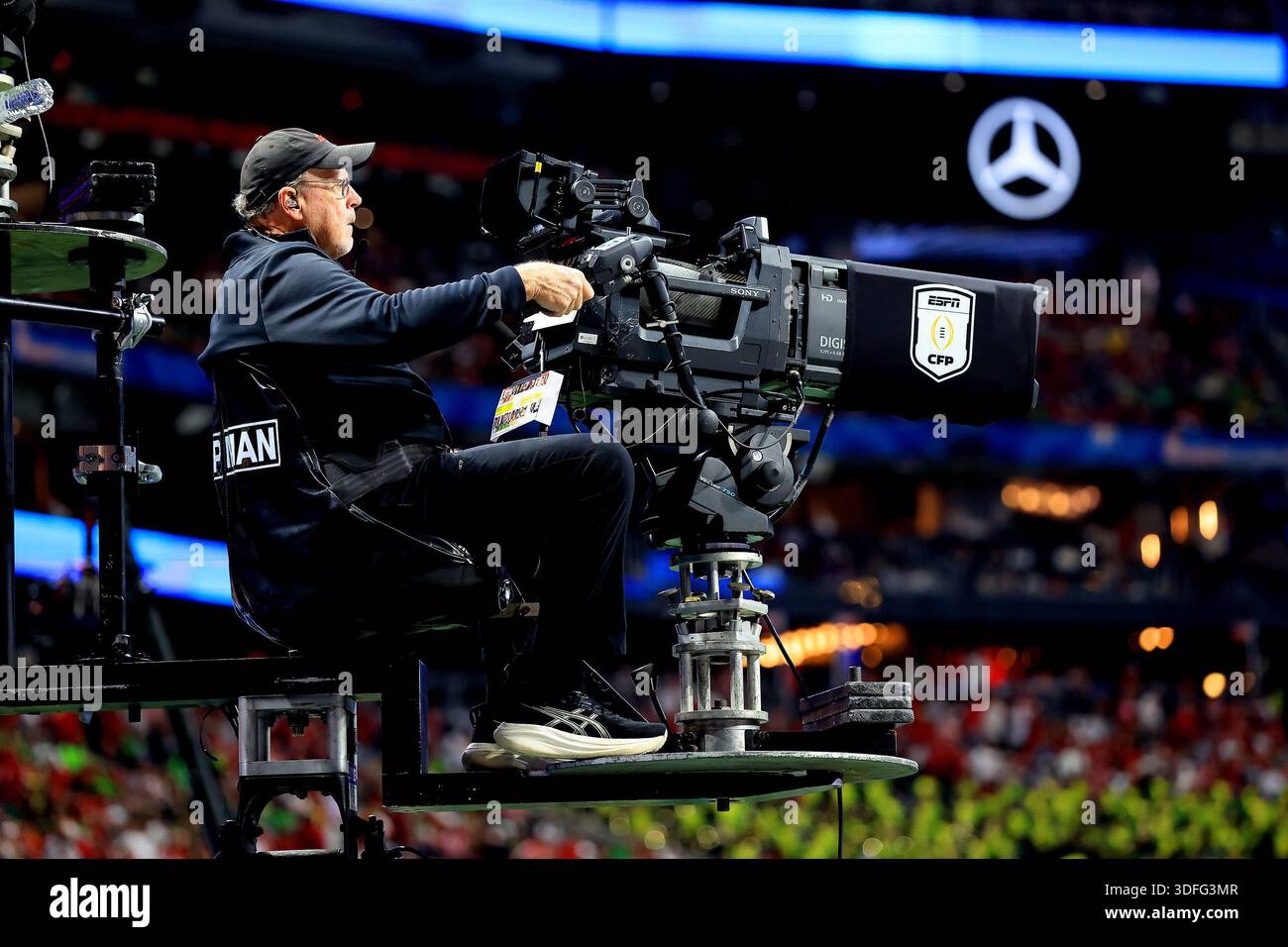 ATLANTA, GA - JANUARY 09: An ESPN HDTV camera operator captures the ...