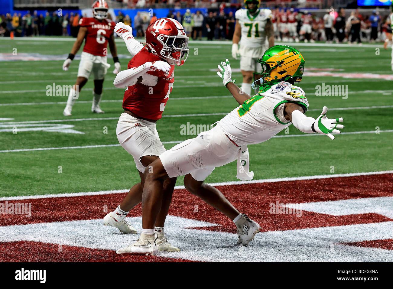 ATLANTA, GA - JANUARY 09: WR Malik Benson #4 of the Oregon Ducks and DB ...