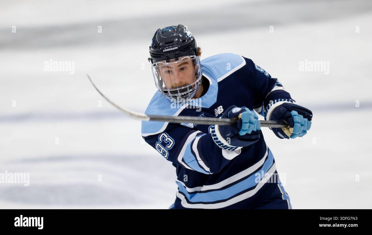 Maine forward Justin Poirier (93) shoots during warm-ups prior to an ...