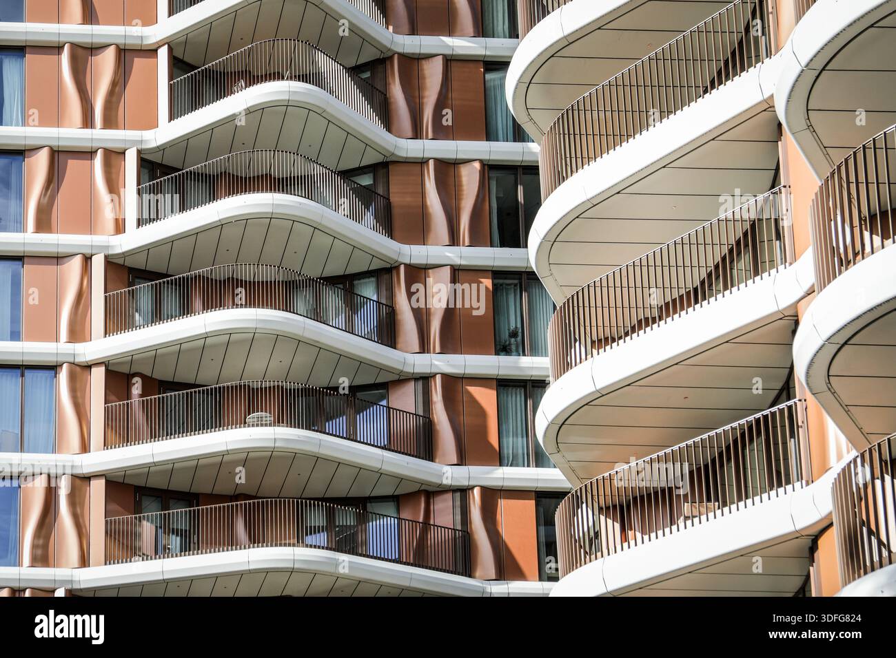 Contemporary Urban Building Featuring Curved Balconies And Modern ...