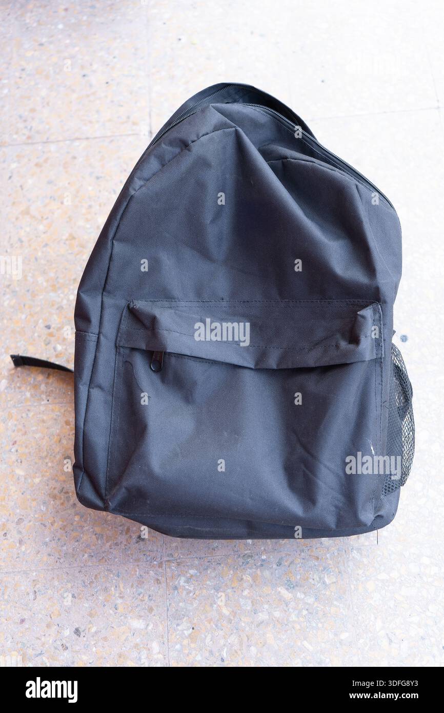Black backpack. Isolated on a background. Stock Photo