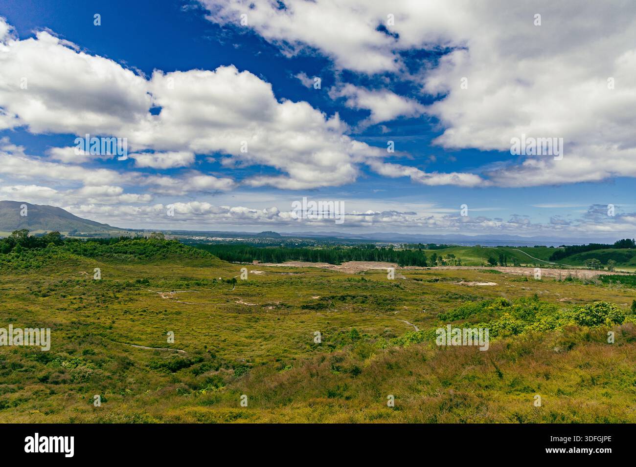 Rolling Green Hills Under Dramatic Cloudy Sky Stock Photo - Alamy