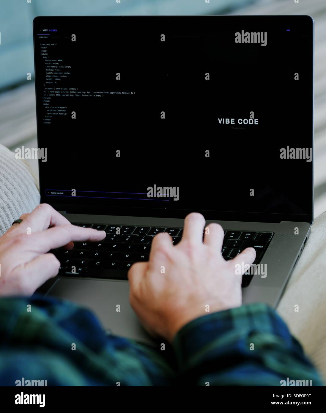 Middle Aged Coder Man Vibe Coding in Artificial Intelligence Infused Integrated Development Environment - Software Engineer Uses AI Based IDE Concept Stock Photo