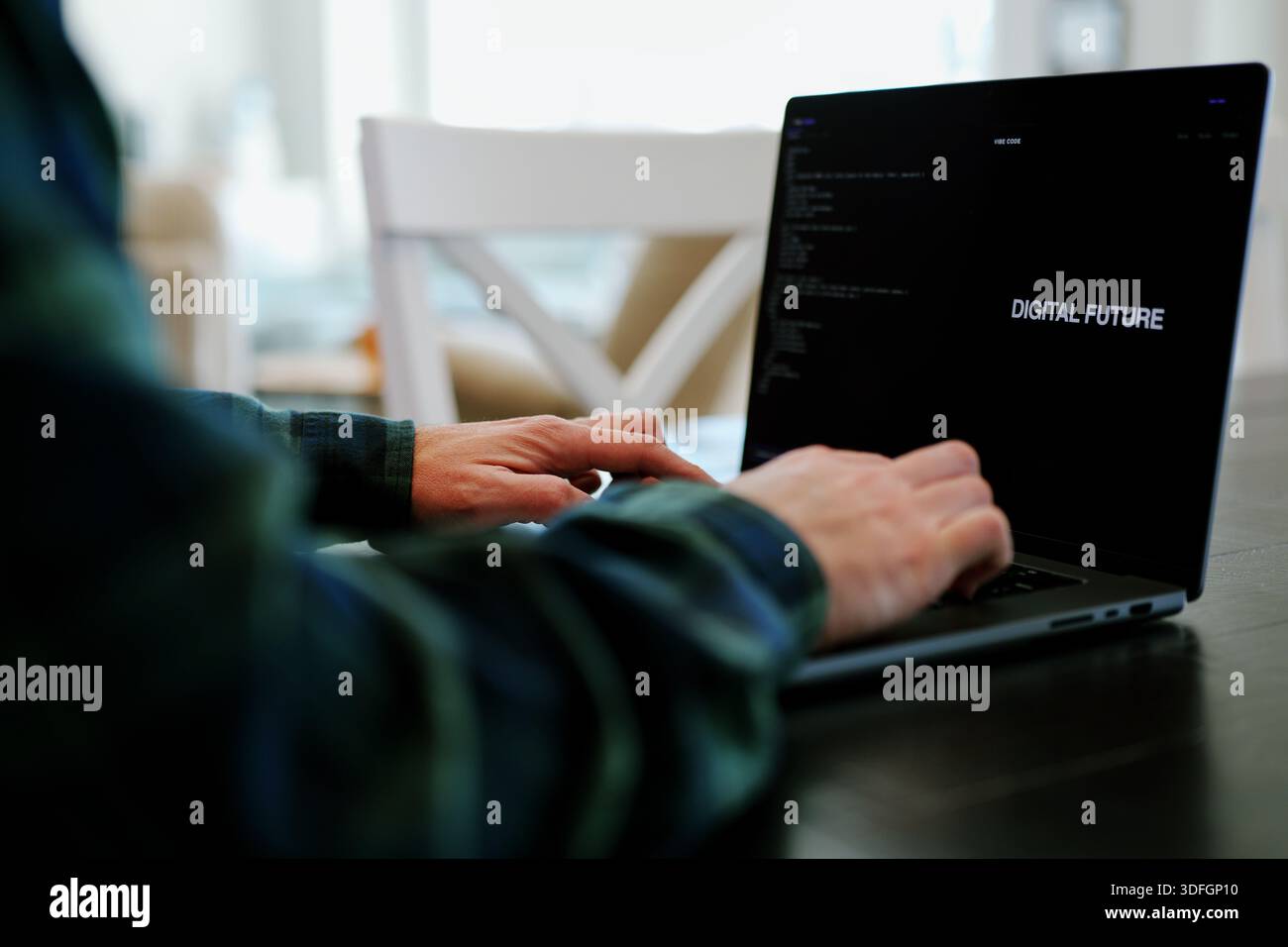 Middle Aged Coder Man Vibe Coding in Artificial Intelligence Infused Integrated Development Environment - Software Engineer Uses AI Based IDE Concept Stock Photo