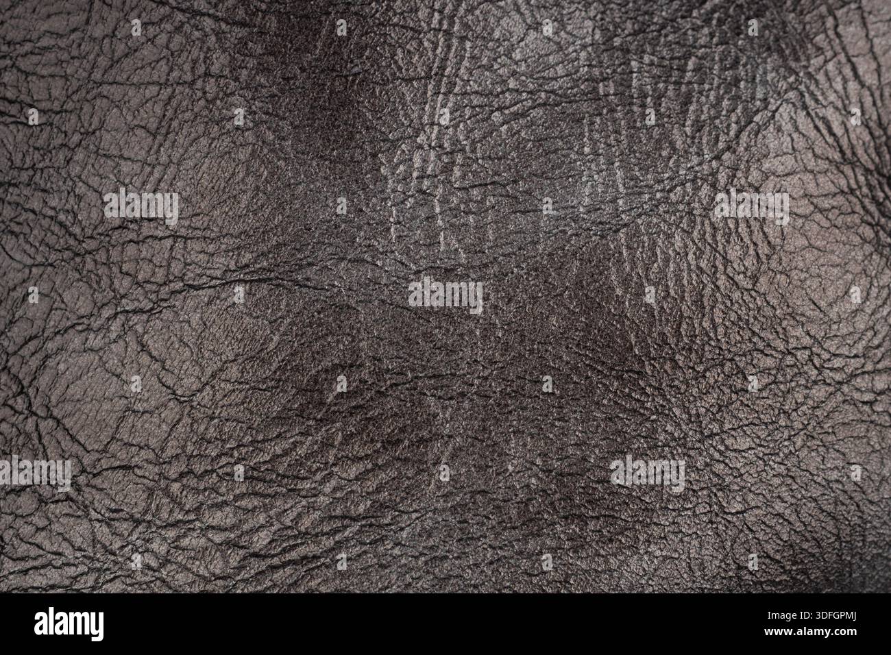 Dark brown wrinkled leather texture surface Stock Photo