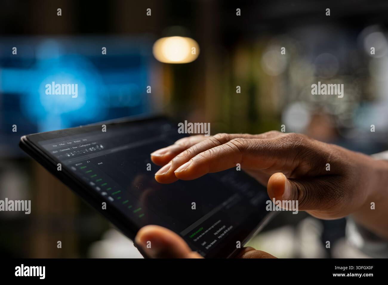 Close up of technician using tablet to write code, developing deep learning APIs. IT expert in tech startup using device to troubleshoot software errors, resolving system crashes Stock Photo