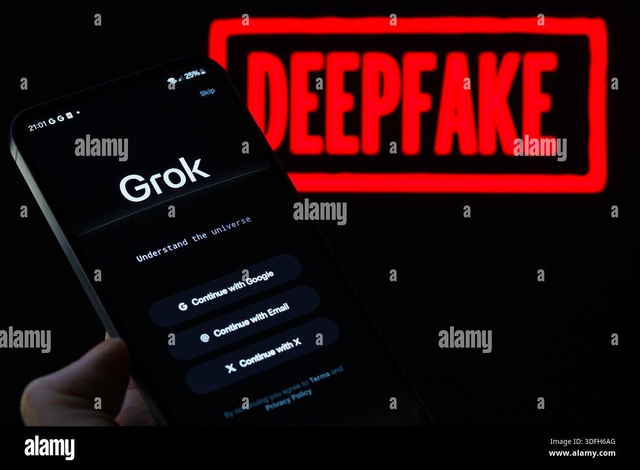 The Grok login page is displayed on a mobile phone in this photo ...