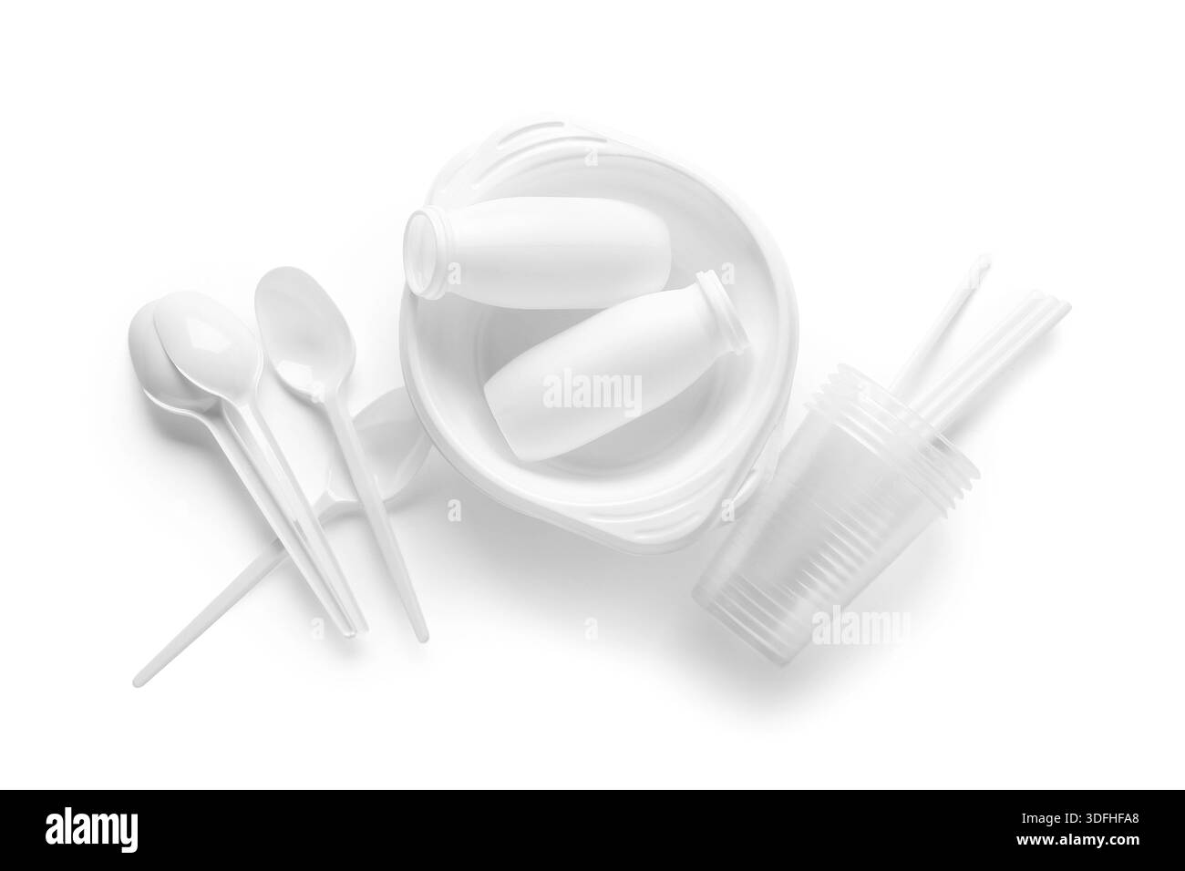 Different plastic tableware on white background Stock Photo