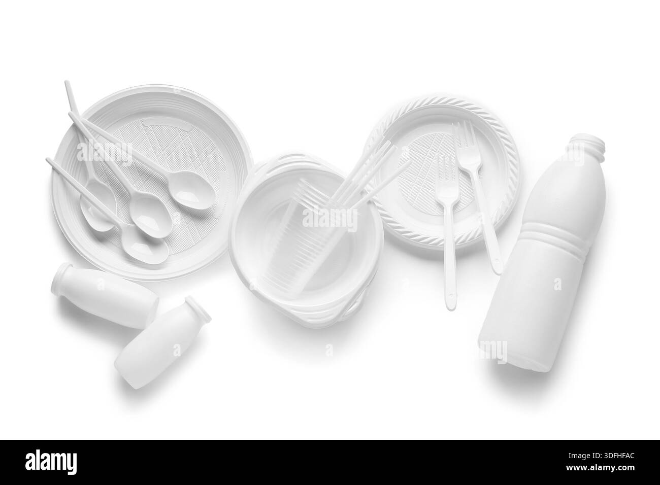 Different plastic tableware on white background Stock Photo