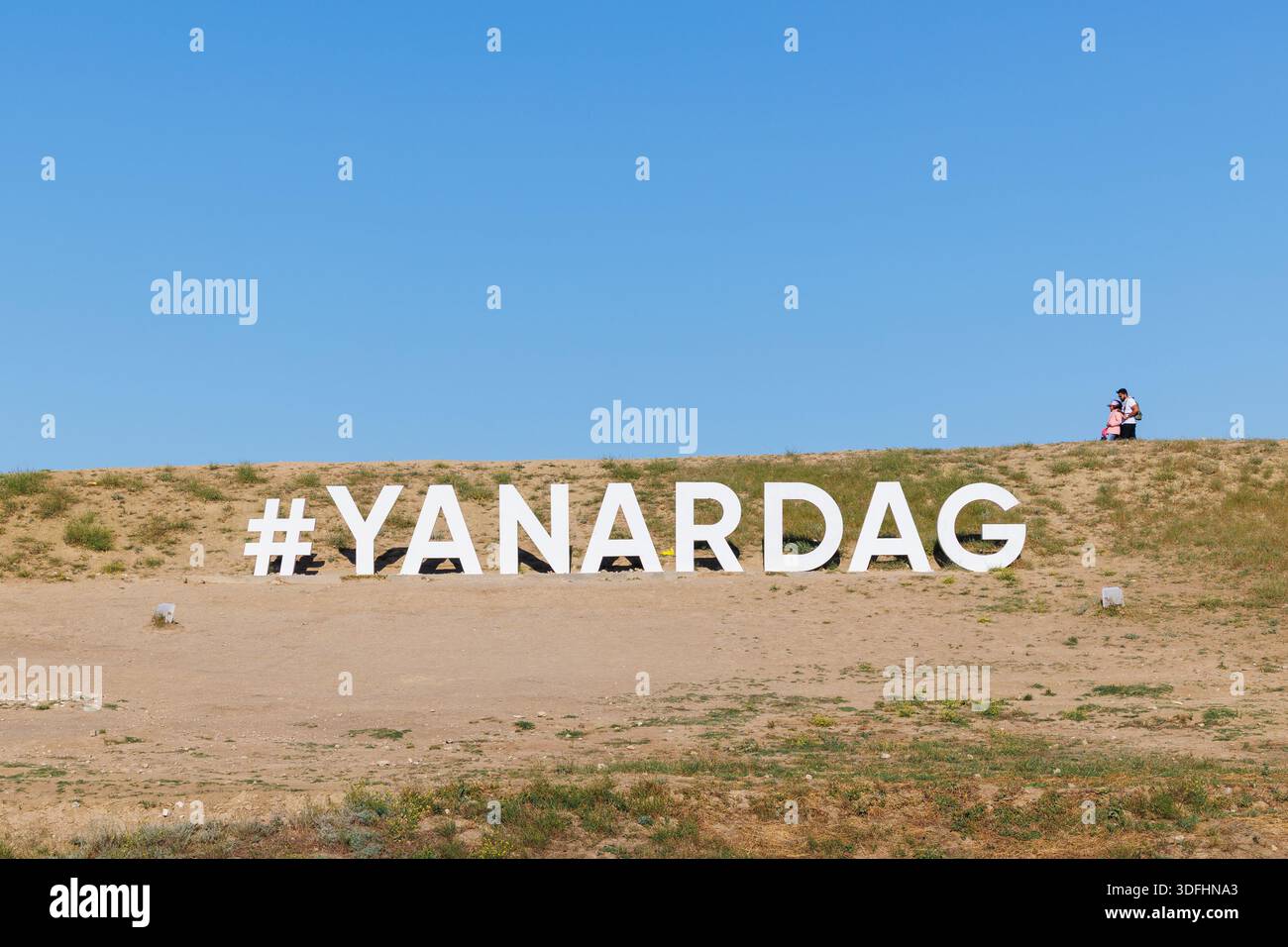 Baku, May 17, 2025, Tourist walk past the sign for Yanardag (Burning(02)