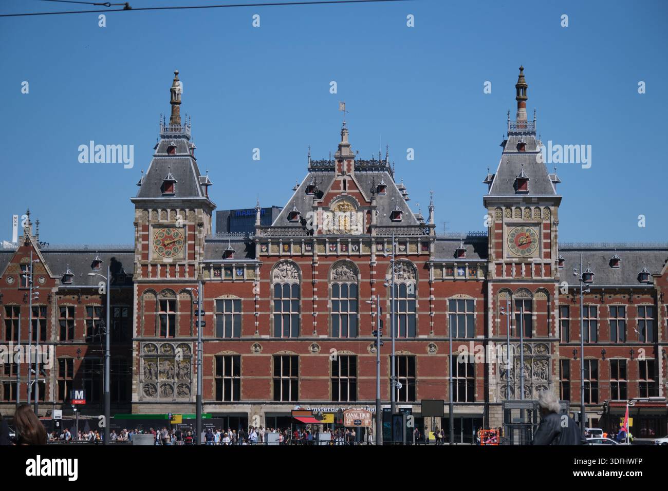 Capture the iconic grandeur of Amsterdam Centraal Station, a ...