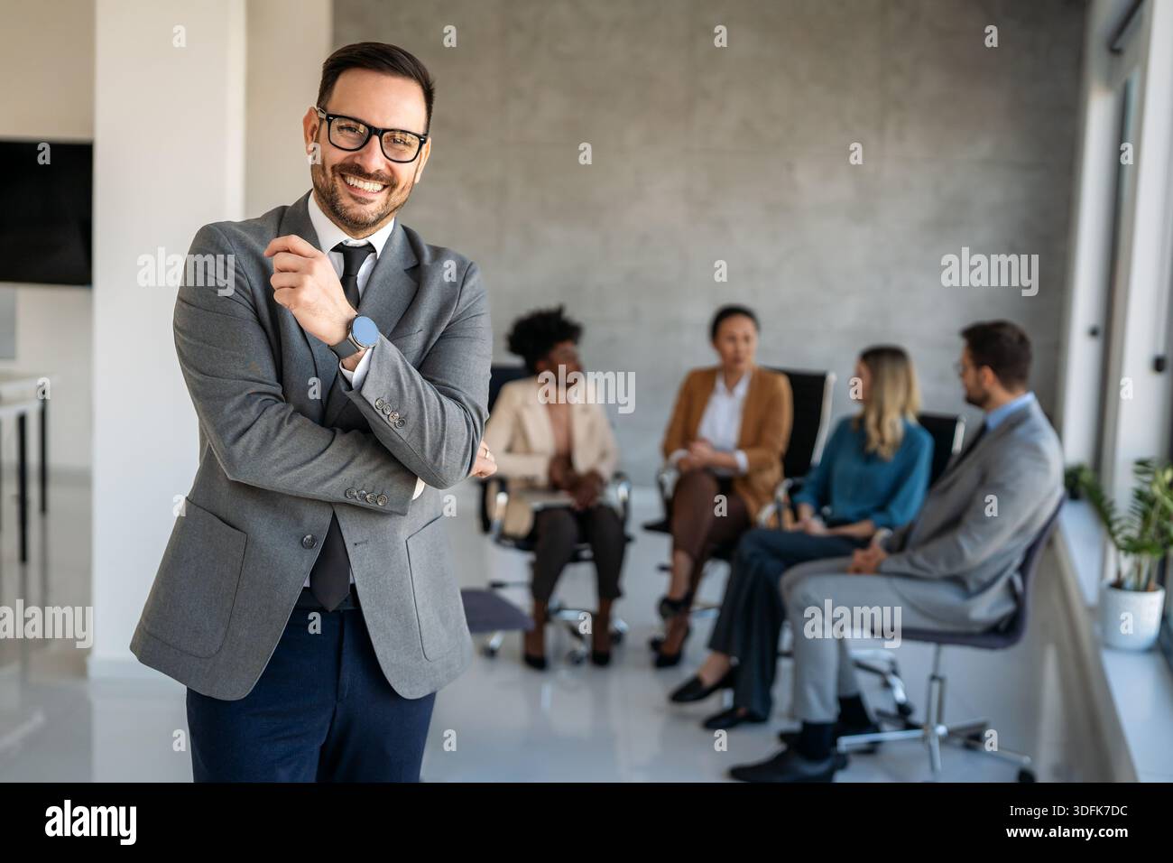 Professional in office environment, highlighting teamwork, collaboration, leadership, and innovation Stock Photo