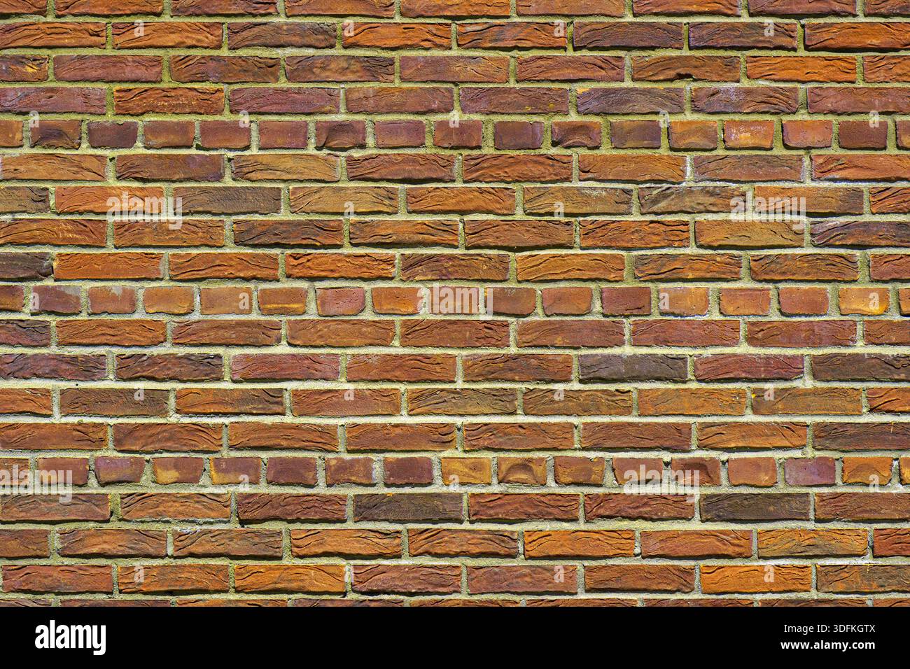 Old orange brick wall. Abstract interior background. Stock Photo