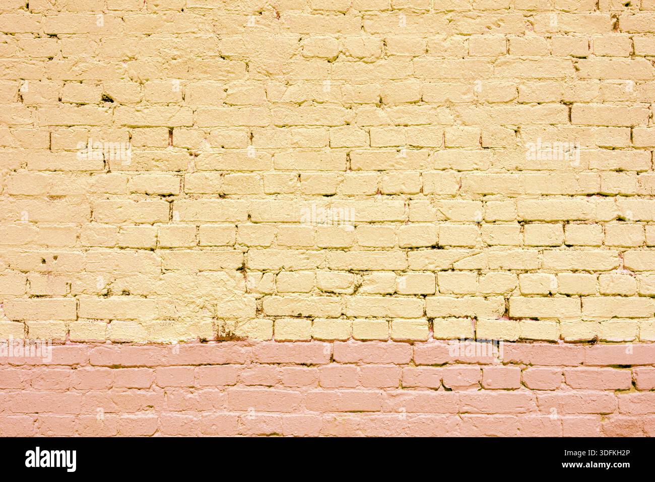 Old yellow brick wall. Abstract interior background. Stock Photo