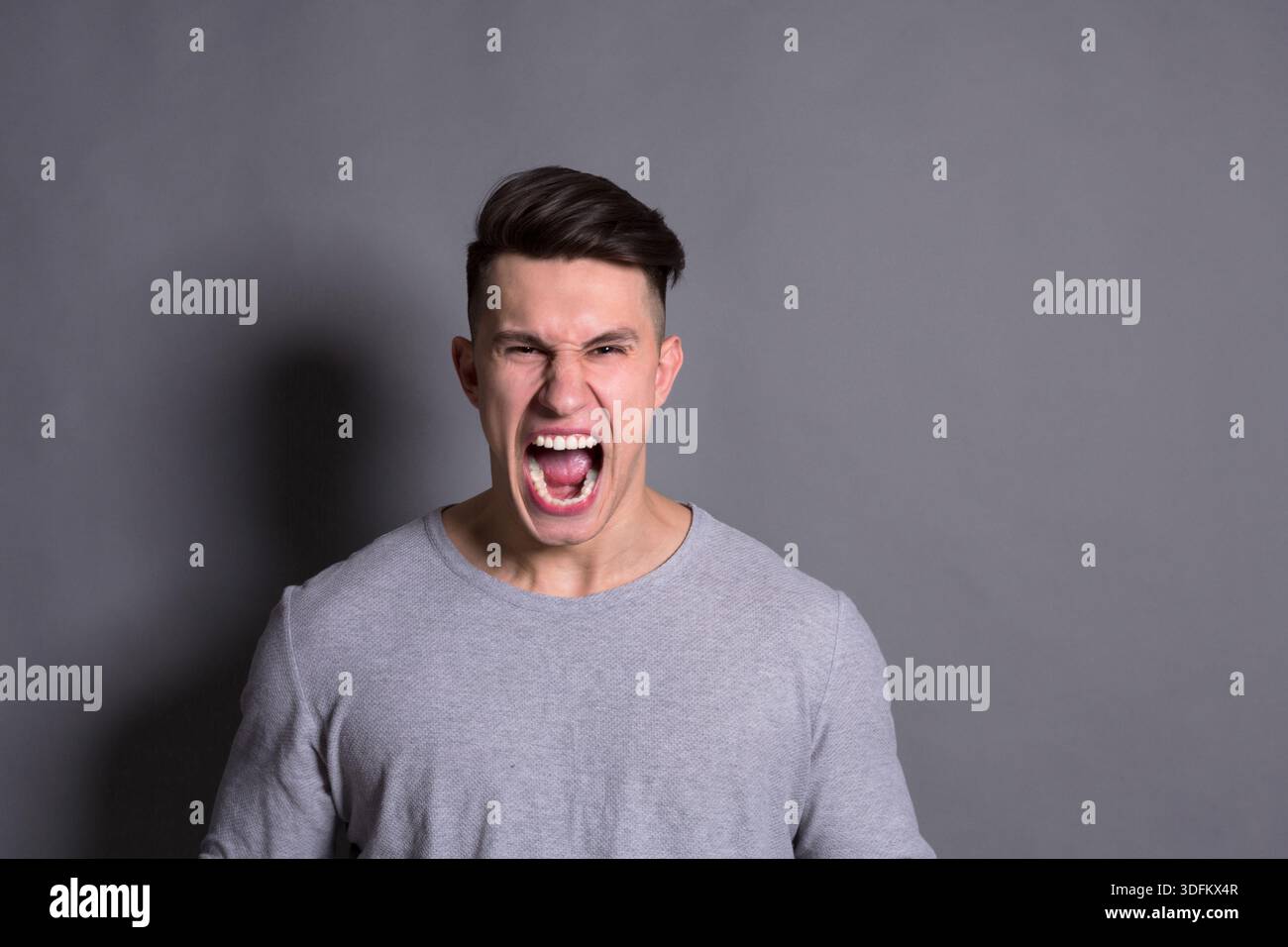 Dynamic figure fierce expression hi-res stock photography and images ...