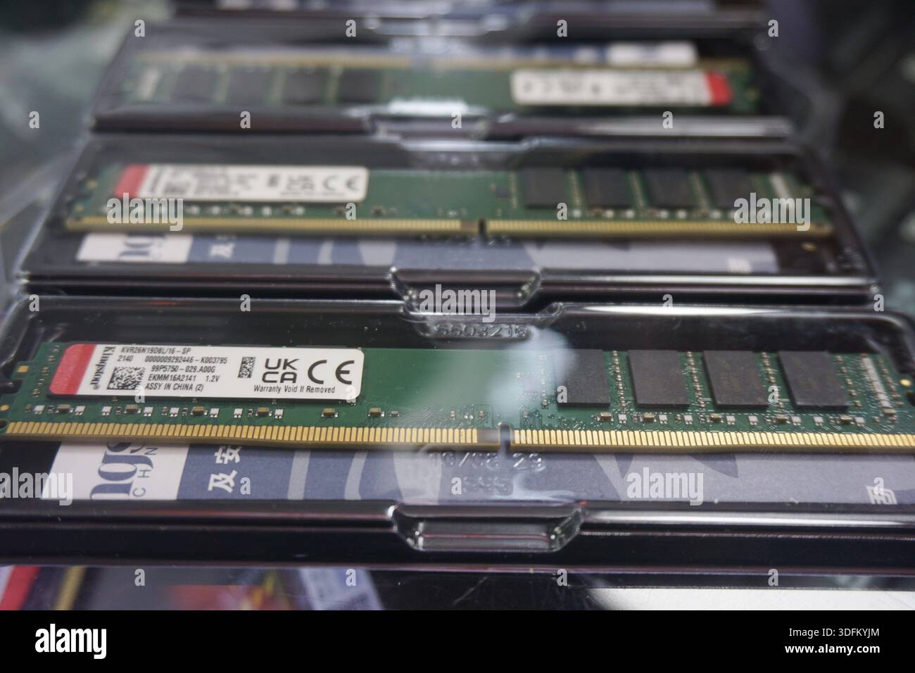 A vendor displays RAM sticks at an electronics market in Hangzhou, in ...