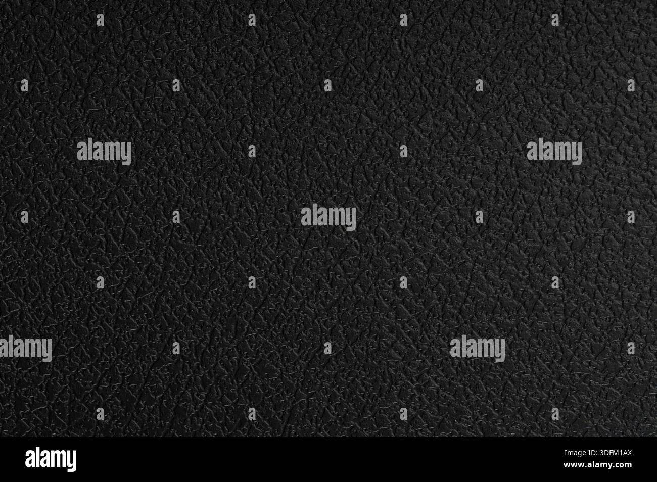 Black rough plastic texture abstract pattern macro close up view Stock Photo
