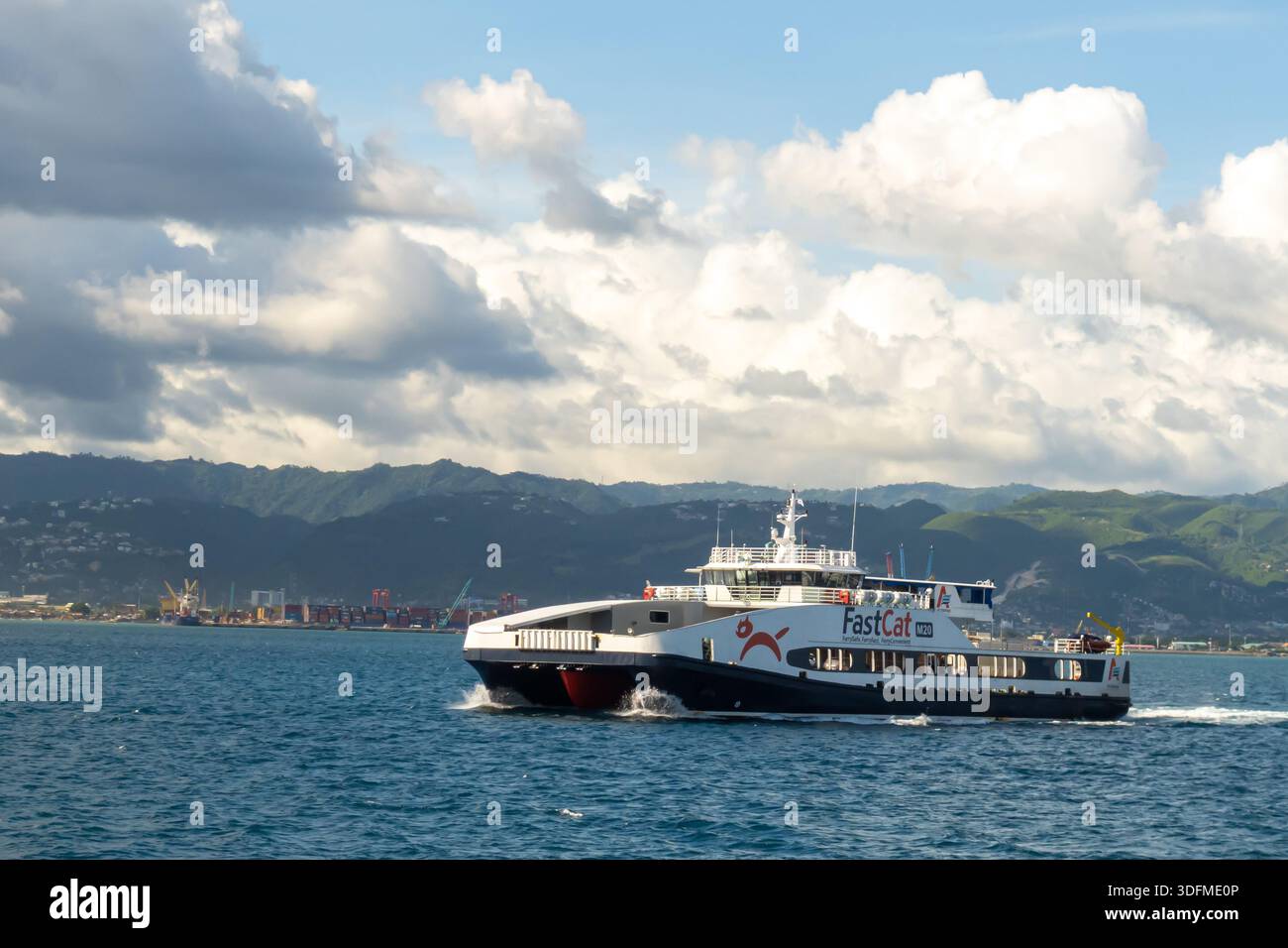 FastCat M20 ferry, a roll-on/roll-off (Ro-Pax) catamaran operated by Archipelago Philippine Ferries Corporation (APFC). Near Cebu, Philippines Stock Photo