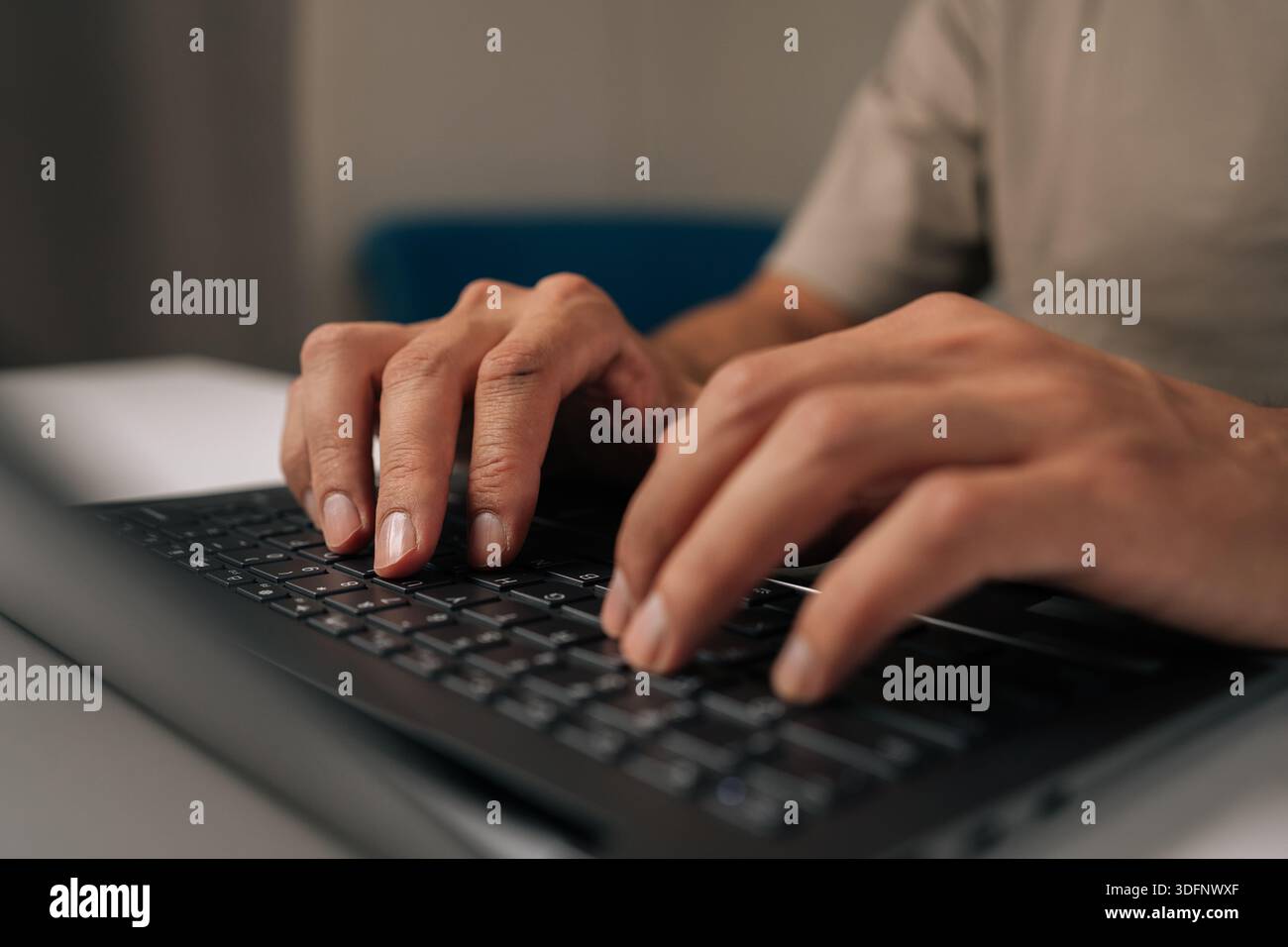 Close-up hands of unrecognizable programmer male typing code on laptop keyboard, showcasing process of software development and coding expertise. Stock Photo
