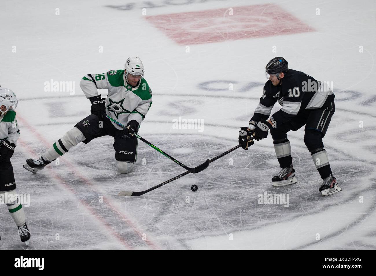 Los Angeles Kings right wing Corey Perry (10) challenges Dallas Stars right  wing Mikko Rantanen (96) for possession during a NHL hockey game, Monday,  January 12, 2026, at Crypto.com, in Los Angeles,