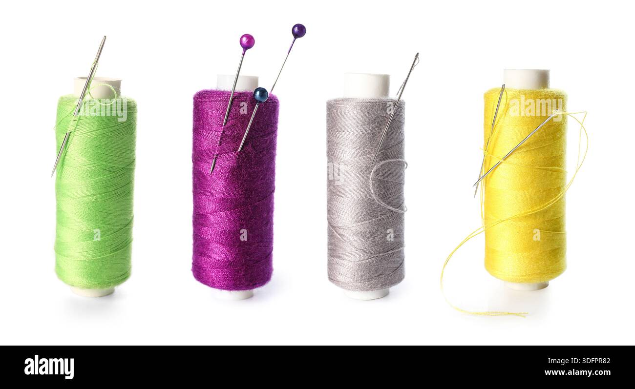 Set of colorful thread spools on white background Stock Photo