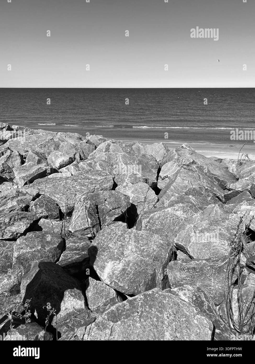 Rocky Shoreline of Lake Michigan under a Wide open Sky - Smartphone Captured Stock Image