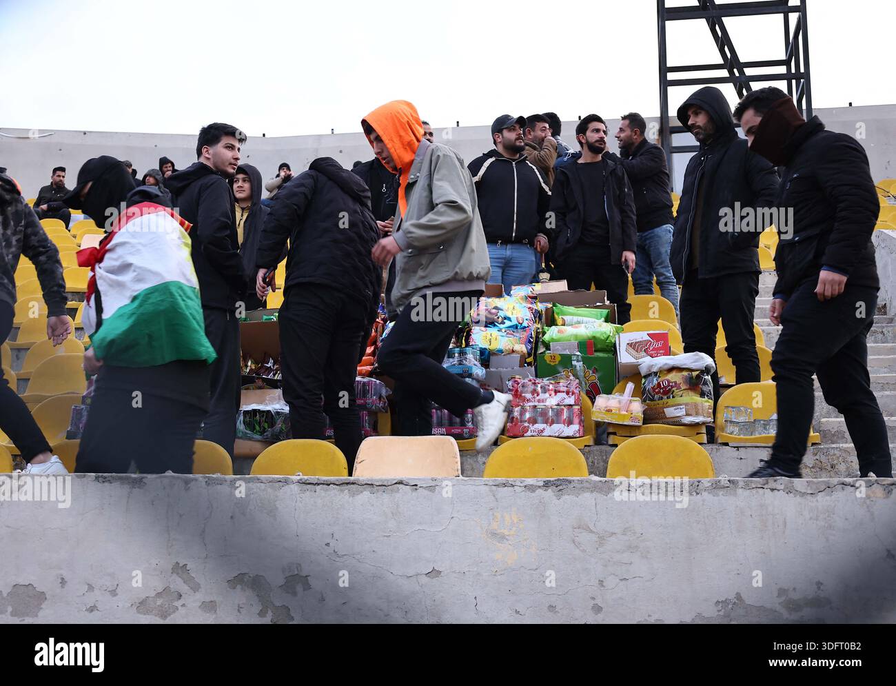 Erbil, Iraq. 13th Jan, 2026. Erbil SC supporters celebrate during the ...