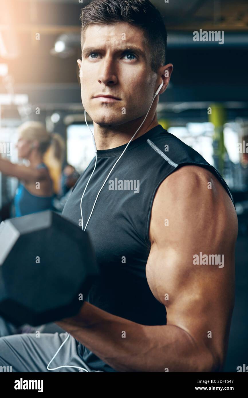Bodybuilder Thinking Thinking, dumbbell and earphones with man in gym for streaming tutorial ...
