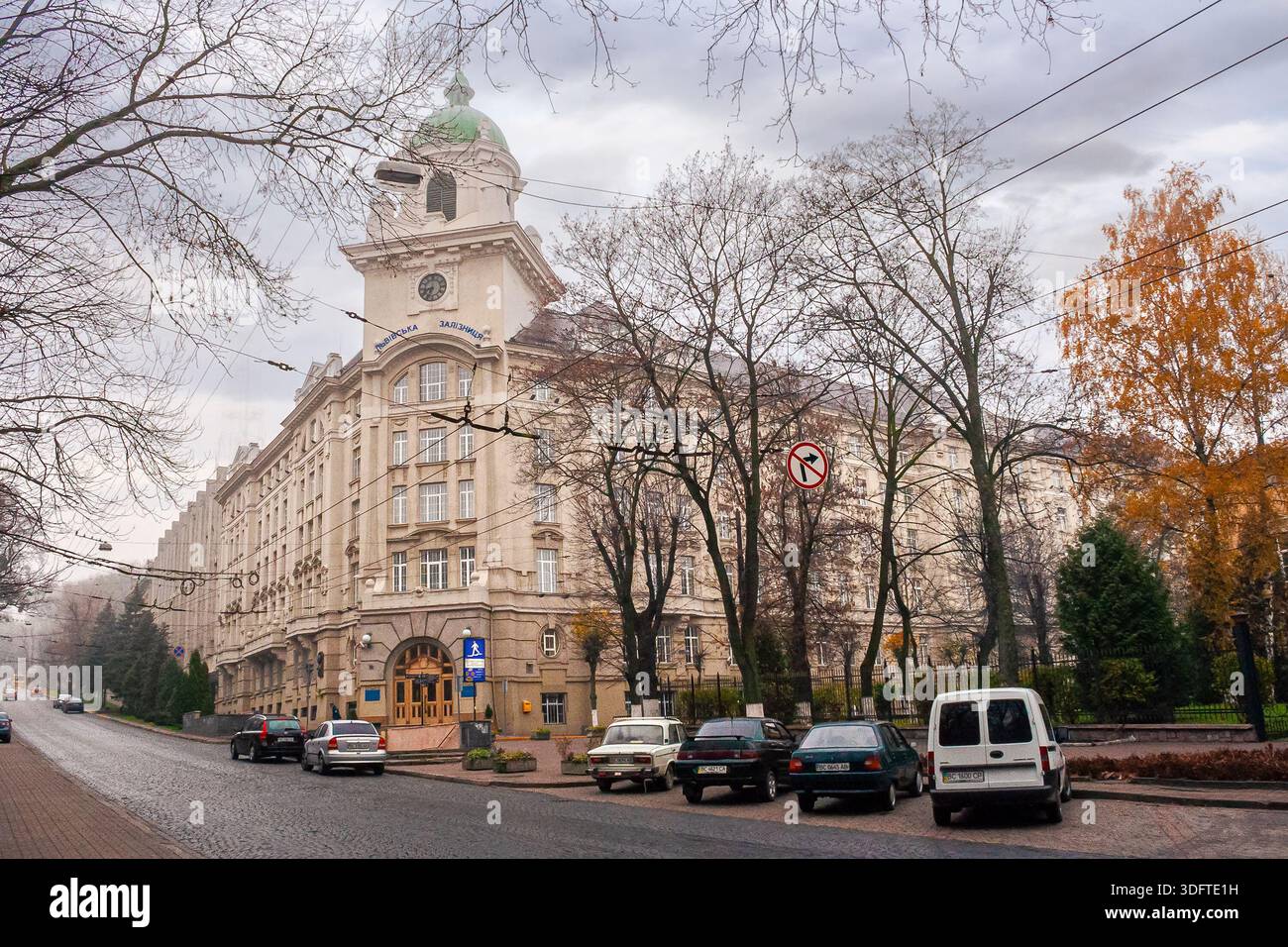 lviv, ukraine - 17 nov 2012: view of lviv city architecture on a misty morning. concept scene of old town with cobblestone street. background for trav Stock Photo