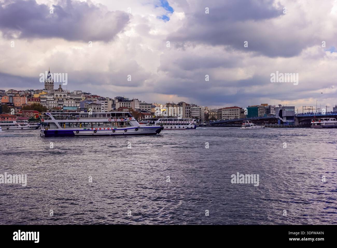 Istanbul, Turkey - December 2, 2025 - ferries on the Golden Horn on a moody day - Stock Image