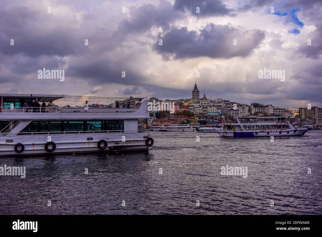 Istanbul, Turkey - December 2, 2025 - ferries on the Golden Horn on a moody day - Stock Image