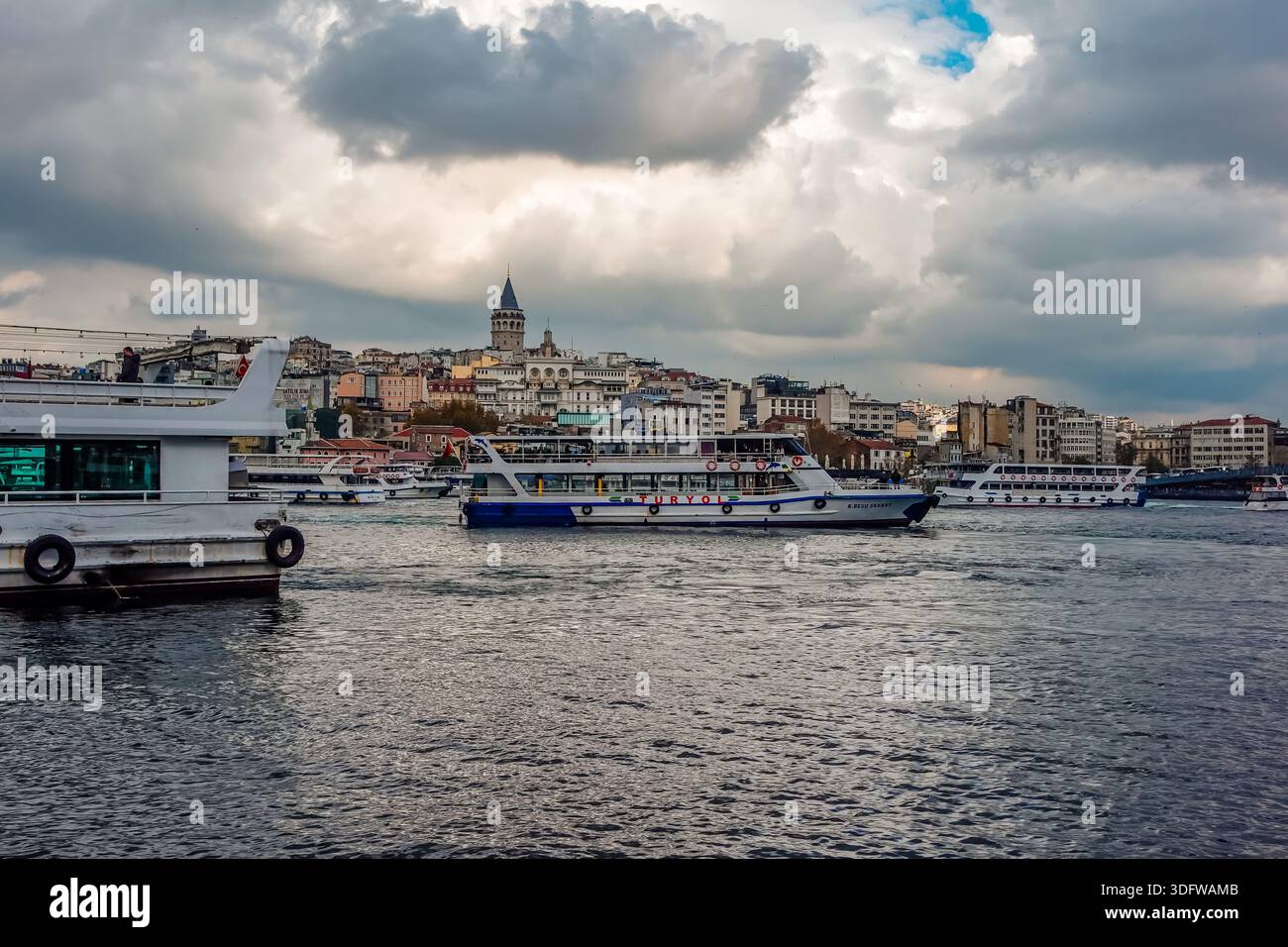 Istanbul, Turkey - December 2, 2025 - ferries on the Golden Horn on a moody day - Stock Image