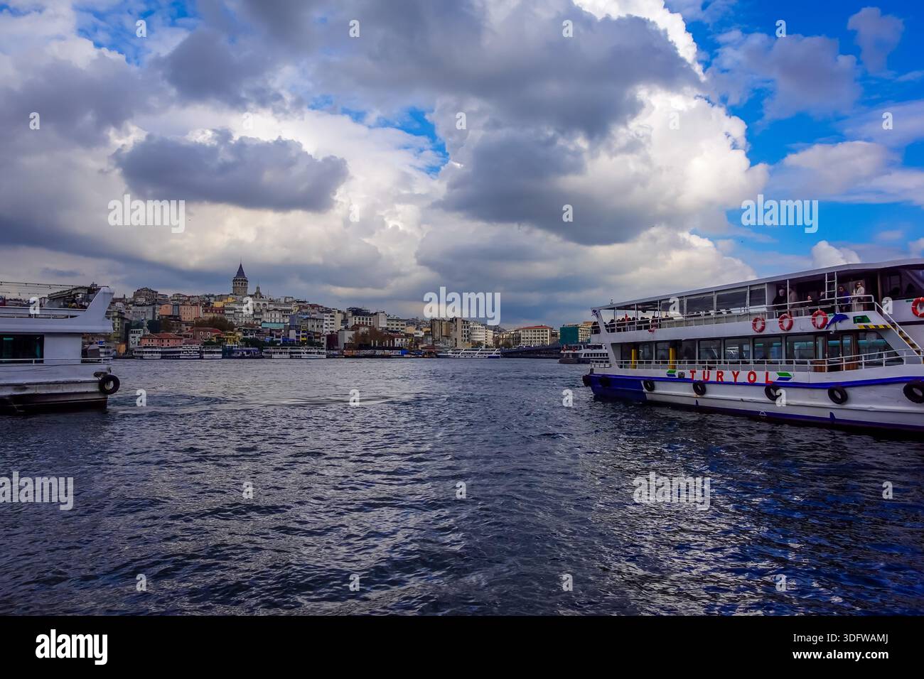 Istanbul, Turkey - December 2, 2025 - ferries on the Golden Horn on a moody day - Stock Image