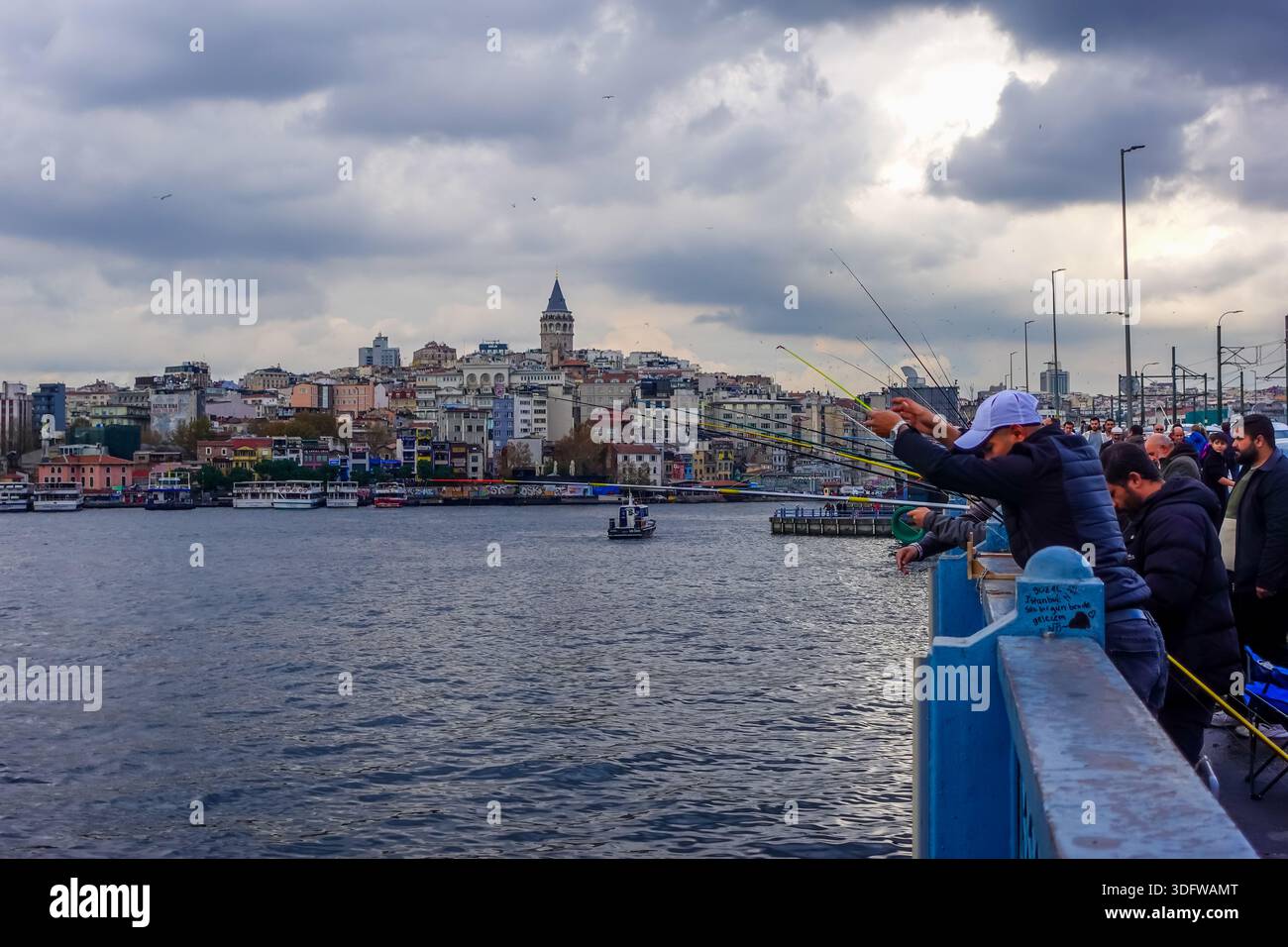 Istanbul, Turkey - December 2, 2025 - ferries on the Golden Horn on a moody day - Stock Image