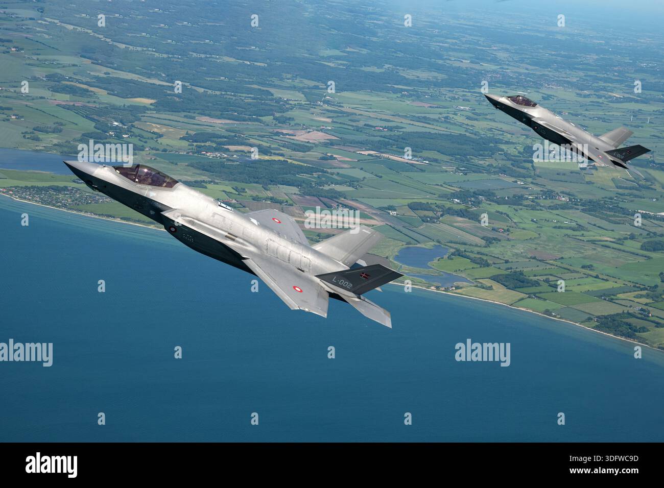 Lockheed Fighter Formation Air-to-air photograph of Royal Danish Air Force Lockheed Martin F-35A ...