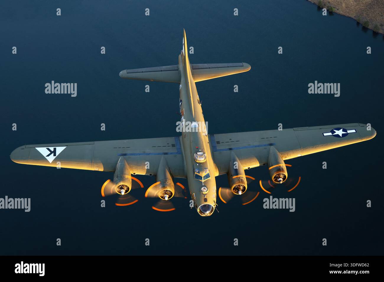 This overhead air-to-air view features the Boeing B-17 Flying Fortress ...