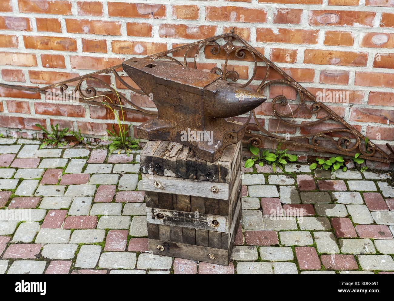 Vintage rusty blacksmith anvil for iron work Stock Photo