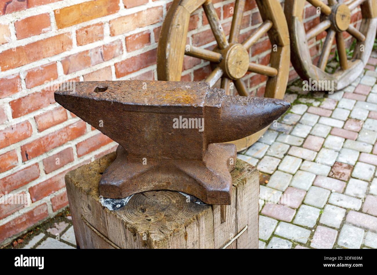 Old rusty blacksmith anvil for iron work Stock Photo
