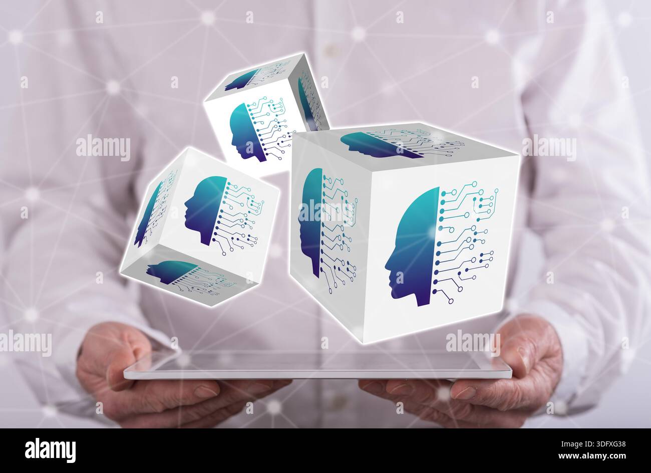 Machine learning concept above a tablet held by a man in background Stock Photo