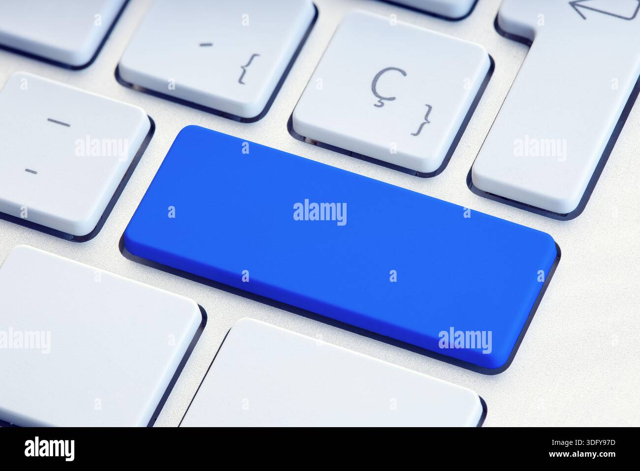 Blue blank key on white computer keyboard mockup Stock Photo