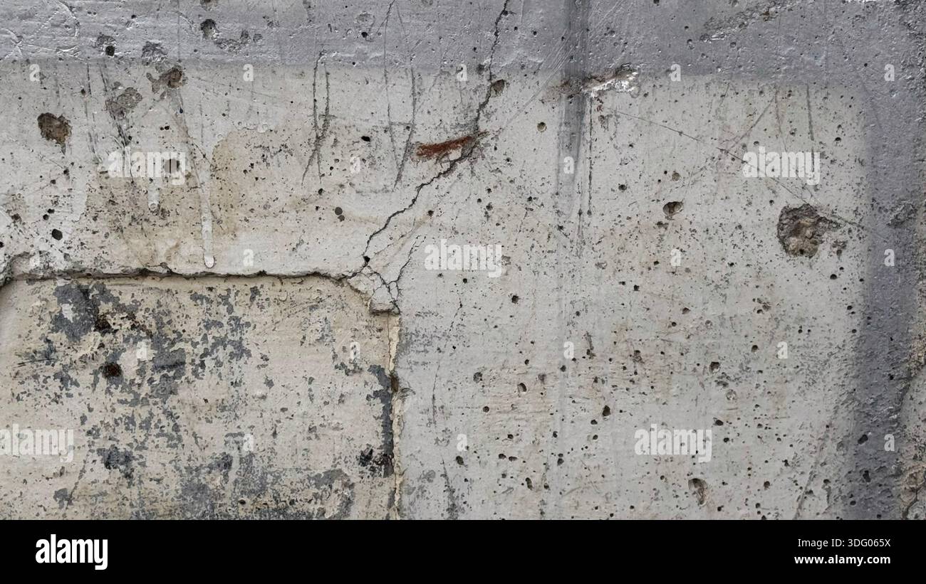 Textured Concrete Wall with Cracks and Imperfections Stock Photo - Alamy
