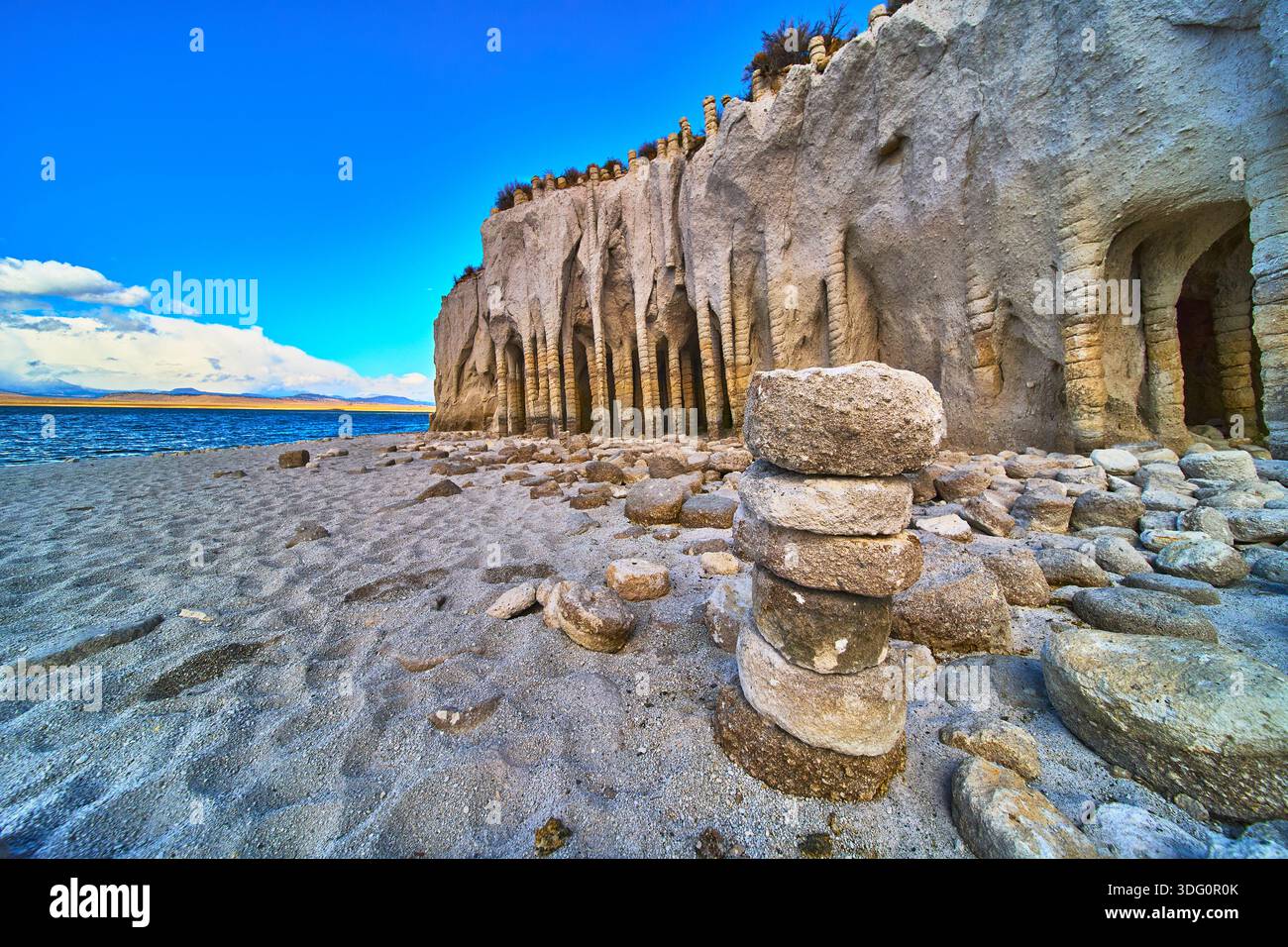 A dramatic rock stack stands before the iconic Crowley Lake Stone ...