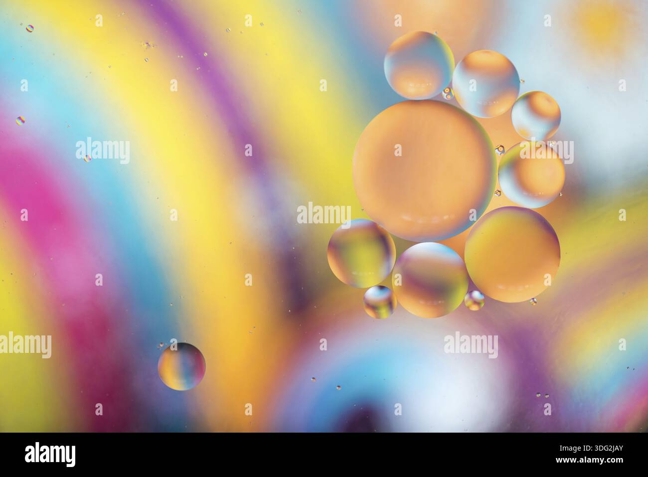 Oil drops in water. Abstract psychedelic pattern image rainbow colored. Abstract background with colorful gradient colors Stock Photo
