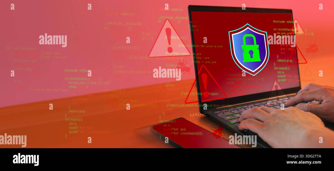 Stop Sign Ransomware Attack Hands typing on laptop with digital shield lock and warning signs over ...