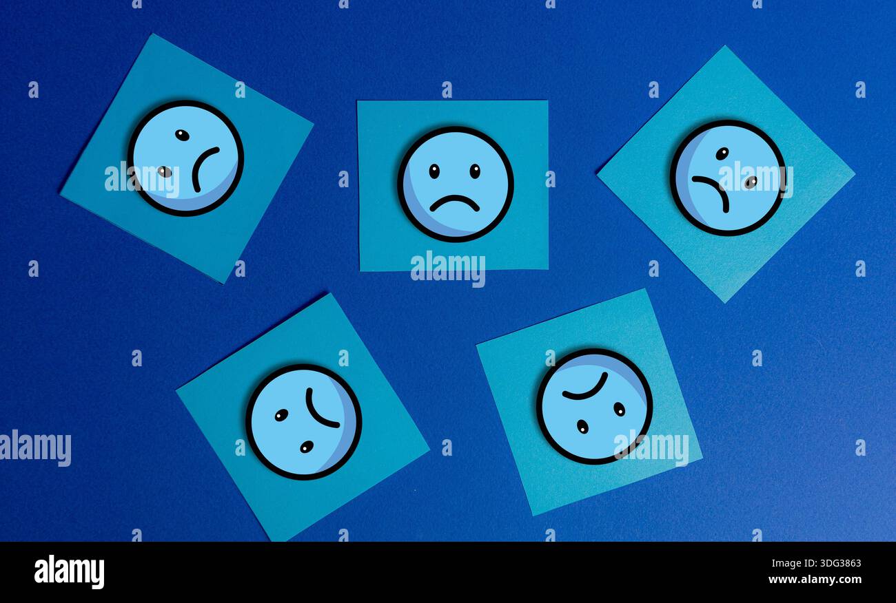 Composition of five square sticky notes featuring graphic icons of sad ...