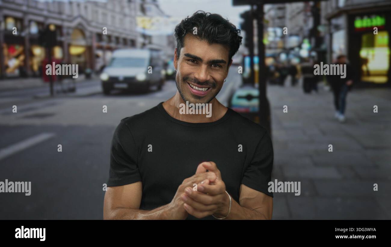 Hispanic man clapping outdoor hi-res stock photography and images - Alamy
