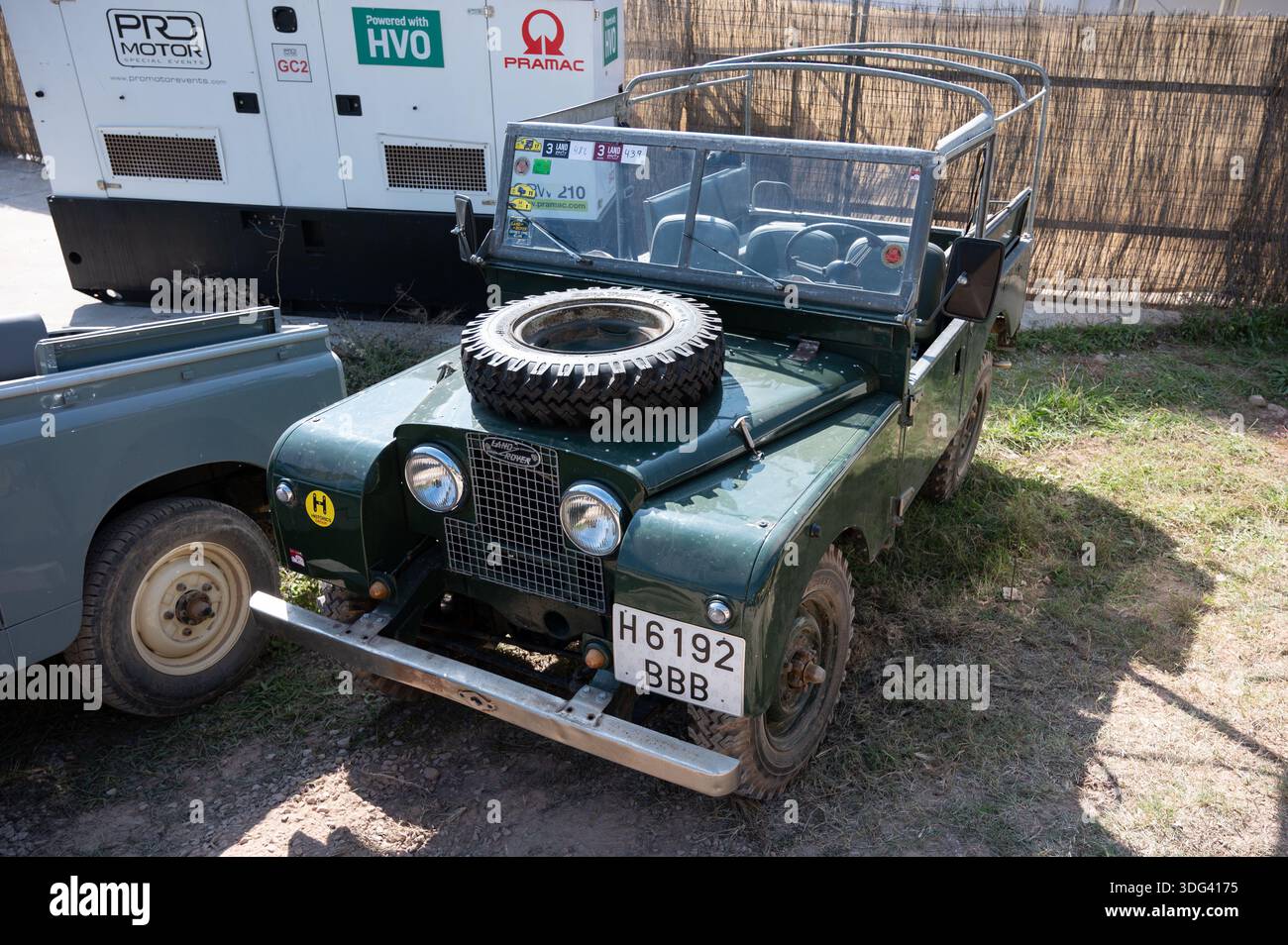 Top front view of an iconic restored green Land Rover Series I with a ...