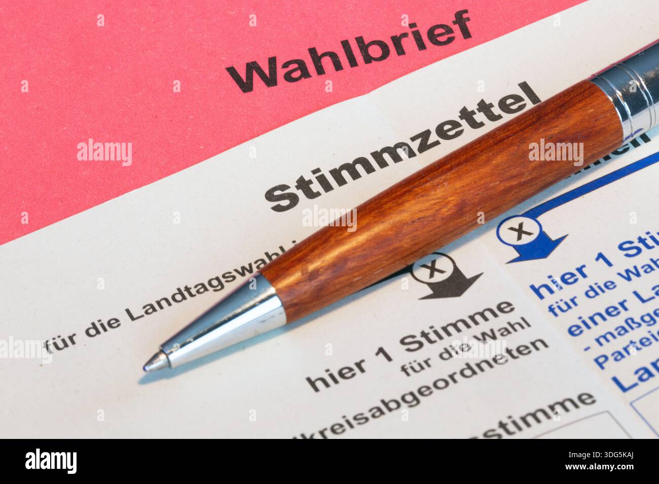 Postal vote Symbolic image: Close-up of a postal ballot with accompanying ballot paper Stock Photo