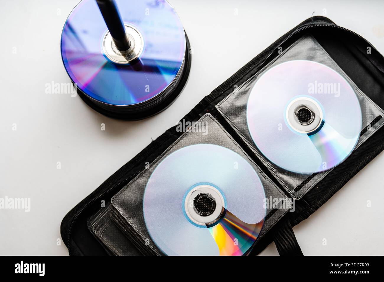 Bunch of CD and DVD discs organized in a disc holder. Stock Photo